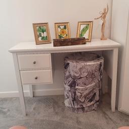 White dressing table with 2 drawers.
There has been some damage to one set of legs where they join to the table top, but can easily be fixed with wood glue and cannot be seen as it is on the underside - it doesn't affect the functionality of it at all. Have not fixed it in the case buyer wants it dismantled. 

Originally bought for £80