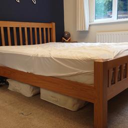 Selling a king sized solid oak bed - in perfect condition. Can disassemble once purchase has been agreed. Fits a standard sized king size mattress.

Dimensions:
Head End Height:	1020mm
Foot End Height:	570mm
Overall Width:	1610mm
Overall Length:	2170mm
Underbed Clearance:	210mm

Mattress not included. All mattress support beams included.

Pick up only, no delivery.