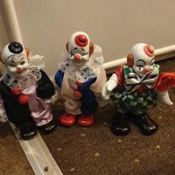 set of three well looked after soft bodied clowns pottery heads hands and feet