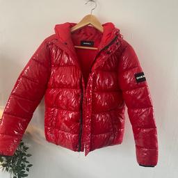 Brand new Diesel girls coat. Size is for 12 year olds but would also fit petite adult. Never been worn, still has tags. Comes from clean, smoke free and pet free home