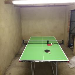 3/4 size of standard table. Perfect for adults and all the family. Recently purchased, selling due to some hairline cracks on table, does not affect play. I'm getting free replacement. See pictures. Dimensions 206x115x77cm. Complete with bats and balls. Cannot deliver, only collection from Dagenham area.