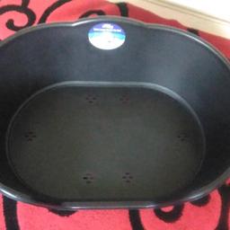 brand new black plastic dog bed would suit Labrador size dog .says XL but too small for our mastiff
