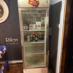 Tall Stella fridge with 3 shelves all works fine apart needs a new bulb for the light