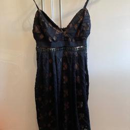 Babydoll dress brand new, never worn.
Bought from TK Maxx.
Size L - would fit size 14 I’d say as it fits me but I’m not going to be wearing it. My babydoll days are over.
Has skin coloured lining.
Would say it would look better on someone with a chest larger than an A cup. 
Be great for the party season.

Collection B31 3TH
Collection only unless you are making a number of purchases in which case I might consider local drop off.