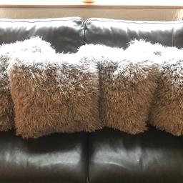 4 NEXT grey sparkle cushions. Great condition. 
£30 or nearest offer for all 4 of them.