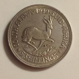 Zum Verkauf kommt die Münze 5 Shillings Springbock von 1949. Die Münze ist aus Silber mit einem Feingehalt von 800/1000. Die Münze hat einen Durchmesser von 39 mm. Im Verkaufspreis sind die Versandkosten (innerhalb von Deutschland) enthalten. Kein PayPal.