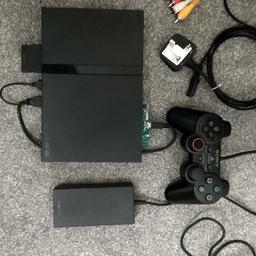 This ps2 slim has been modified with freemcboot to play games off of a 2.5" hard drive, the hard drive is internal where the original disc drive was so will no longer play original games. There are over 700gb of games but some space for a few more, you can just connect the usb to a pc to add more games. If you want to add more games I can provide info on how to do that. There are also some other retro systems too such as nes, snes and megadrive. Questions welcome