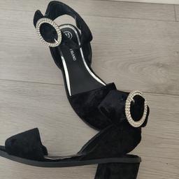 Girls River island sandals size 1 in black suede. Silver diamante detail buckle fastening. Small heel. Worn once due to growth spurt.  From a smoke free and pet free home. Collection Wallasey CH45 or will post for additional cost. PayPal accepted