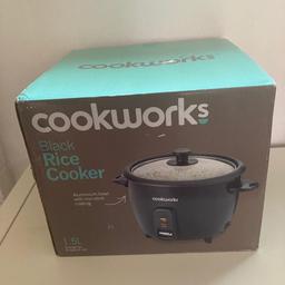 Brand new in box unopened rice cooker. Box has a few marks but still sealed.