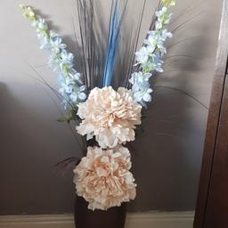 Beautiful floral arrangement with tall vase