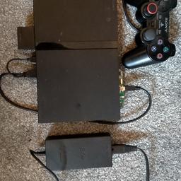 This ps2 slim has been modified with freemcboot to play games off of a 2.5" hard drive, the hard drive is internal where the original disc drive was so will no longer play original games. There are over 700gb of games but some space for a few more, you can just connect the usb to a pc to add more games. If you want to add more games I can provide info on how to do that. There are also some other retro systems too such as nes, snes and megadrive. Questions welcome