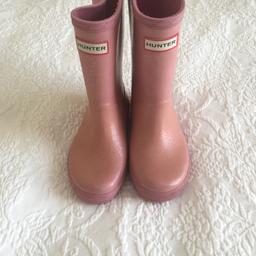 In good used condition, they are in pink colour with glitter.