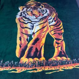 Large tiger blanket 
Used but well loved
240 x 200 cm
Photo taken on my super king size bed