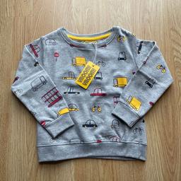 Long sleeved sweatshirt / jumper with a lovely colourful vehicles print featuring cars, buses and trucks. Crew neck with cuffed sleeves and hems, fleece lined.

Perfect for little fans of cars and buses!

BNWT