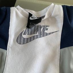 Nike tracksuit 0-3 months 
Used but good condition