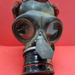 World War Two British Civilian Gas Mask 
1942 - Dated,
Great Display Item Or For Reenactment Purposes...

Feel Free To Contact Us For Further Information...
