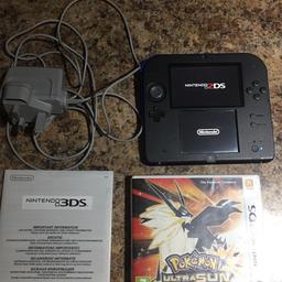 Nintendo 2DS. Is not in the box but comes with charger and Pokemon game. Great condition