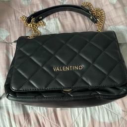 Black Valentino ladies bag
Chain strap/handle (adjustable)
Can be used in various ways ie; shoulder bag/ crossbody bag 
Like new, used twice
Spacious interior with pockets