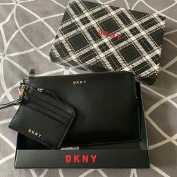 Brand new never used but tags removed DKNY black clutch bag and coin purse genuine and in gift box great for Xmas gift

Will post if postage paid thanks