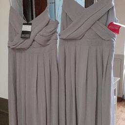2 bridesmaid dresses chiffon wraps over at bust ties down back nice style with labels 《make is girls on film 》size is 14 and 16 price for 1 or deal on the 2 