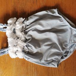 Young girls swimsuit from Monsoon. Excellent condition.