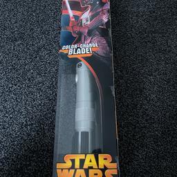 Star Wars Darth Vader Electronic Lightsaber. 
Colour changing blade. Ages 4+. Never used. Box still sealed