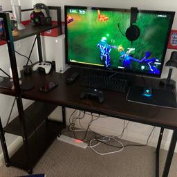 Gaming desk , approx 120cm in length 60cm width, some wear on the desk, sturdy metal frame. Bookcase/ games storage to the side. Part dismantled but can break down further if required.