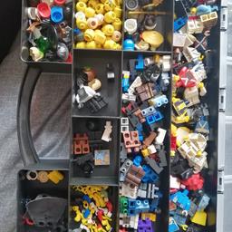 the vast majority is Lego, with about 3 figures worth of fake Lego. comes with the case