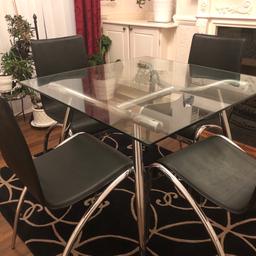 Glass dining table with 4 chairs. For purchase/collection by 08/11/21 as moving house.

- Smoke & pet free home