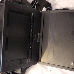 potable dvd player with car charger and wall charger and a carry bag in good working condition