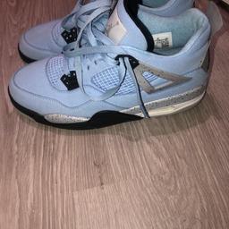 Good company Jordan 4 university blue just a couple dirt marks on top but barely noticeable.