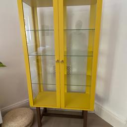 Two yellow, glass display cabinets from the Stockholm range in IKEA. Buyer collects, they can be dissembled back to flat pack.

Width: 90 cm
Depth: 40 cm
Height: 180 cm

£110 each or £200 for both.