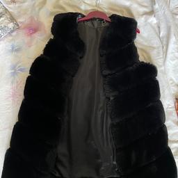 Fake fur gilet I’d say fits size 10-12 best