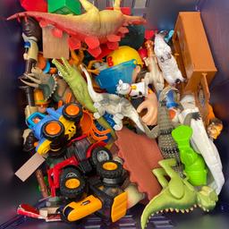 Here is a bag of assorted toys tractors and animals dinosaurs etc in a good played with condition. Please see picture