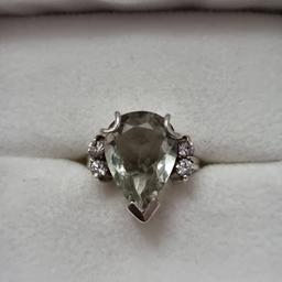 Sterling Silver quartz Ring, large stone. I can't describe the colour, it's seems to have a hint of greeny grey. Lovely used condition and hallmarked. Size M