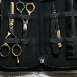 Boxed and in its own case, hair dresser scissors with cut throat razor + 110 blades, they are double sided, so your getting 220.all in boxes bargain £15. Lower offers ignored