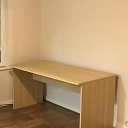 Sturdy large wooden desk. 
Already dismantled, will easily fit in to a car (it fit easily in my Ford Fiesta). 
Good condition, a little worn at the front but a good solid desk.