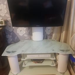 I am selling this white tv stand with tv with good condition. If you want to know further please massage me.