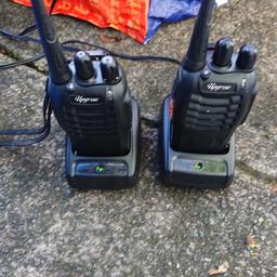 2x upgrow walkie talkies, rechargable
9 channel, ptt button, headphone jack wriat strap, 3 mile radius.
2 charging docks and batteries good.