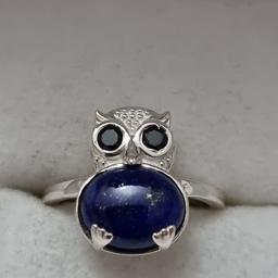 Sterling Silver owl ring with lapis lazuli body abd black spinel eyes. New with tag and hallmarked. Size Q