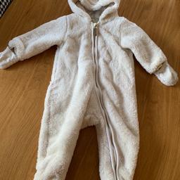 White winter snowsuit, excellent condition 
From pet free house
6-9 months