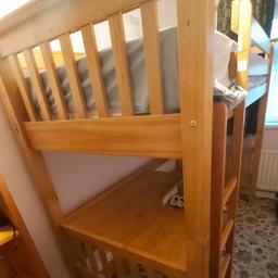 Solid wood Julian Bowen cabin bed with table and ladder. Mattress not included. Bed has been disassembled for now. Arrange your own collection