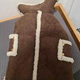 Faux Sheepskin Dog Coat by Pouch Couture. I bought it but it's too small for my dog and by the time I realised it was too late to return. I have still discounted it from what I paid for it x