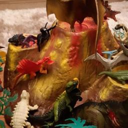 huge selection of dinosaurs with extras also electronic volcano makes awesome sounds, ideal Christmas present .