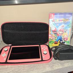 nintendo switch lite with charger and Mario game and charger and pink carry case 
will be factory reset before leaving
selling as doesn't get used, been used about 10 times if that so better to let it go to someone who will use it
collection only mold