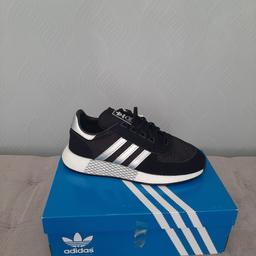 Mens addidas trainers new in box. Size 8 unwanted gift.