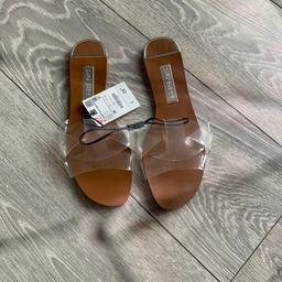 Lovely sandals, with clear plastic straps, brand new and never worn. RRP £25.99