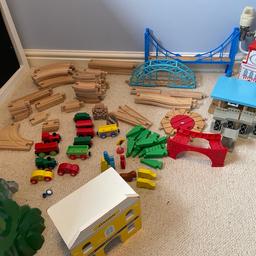 Wooden train set various items including track, trains, buildings and bridges
Cash on collection