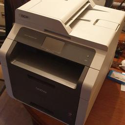 DCP-9020CDW

Built in scanner/copier.
Wi-fi and ethernet.

Needs colour toners if you want to print colour, but has partial black toner so will print in mono fine.

Happy to deliver in Walsall or Wolverhampton for free.

Includes mains cable.