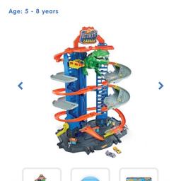 Hot wheels ultimate garage Tallest Ultimate Garage with Menacing Robo T-Rex excellent condition hardly played with
